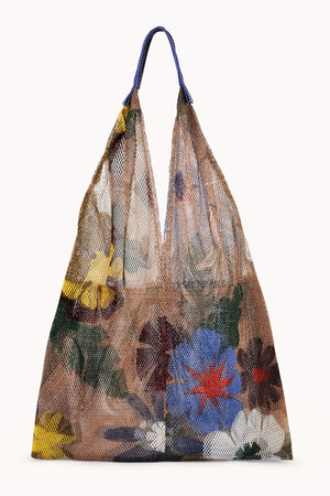 The LARGE FLORAL PRINT MESH TOTE BY EPICE features bold blue, red, yellow, and green hues in a luxe floral design.