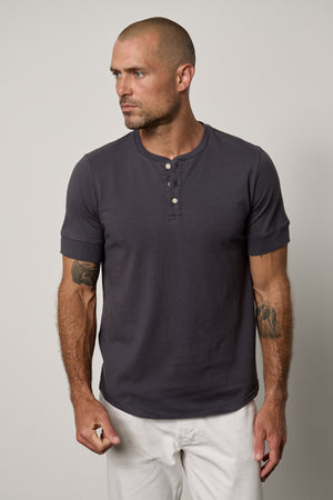 Deon Henley in fleet with white denim front