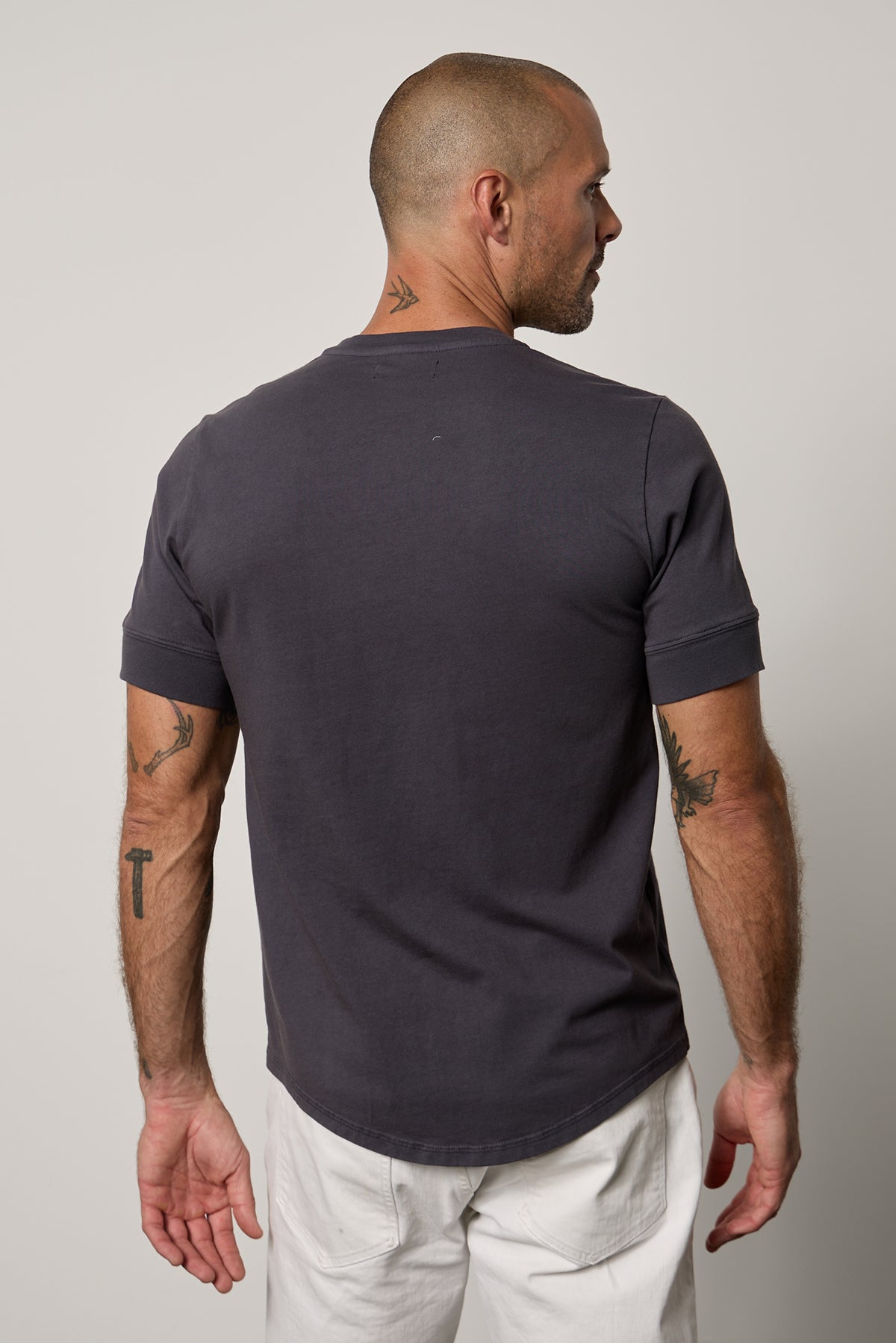 Deon Henley in fleet with white denim back-26266343932097