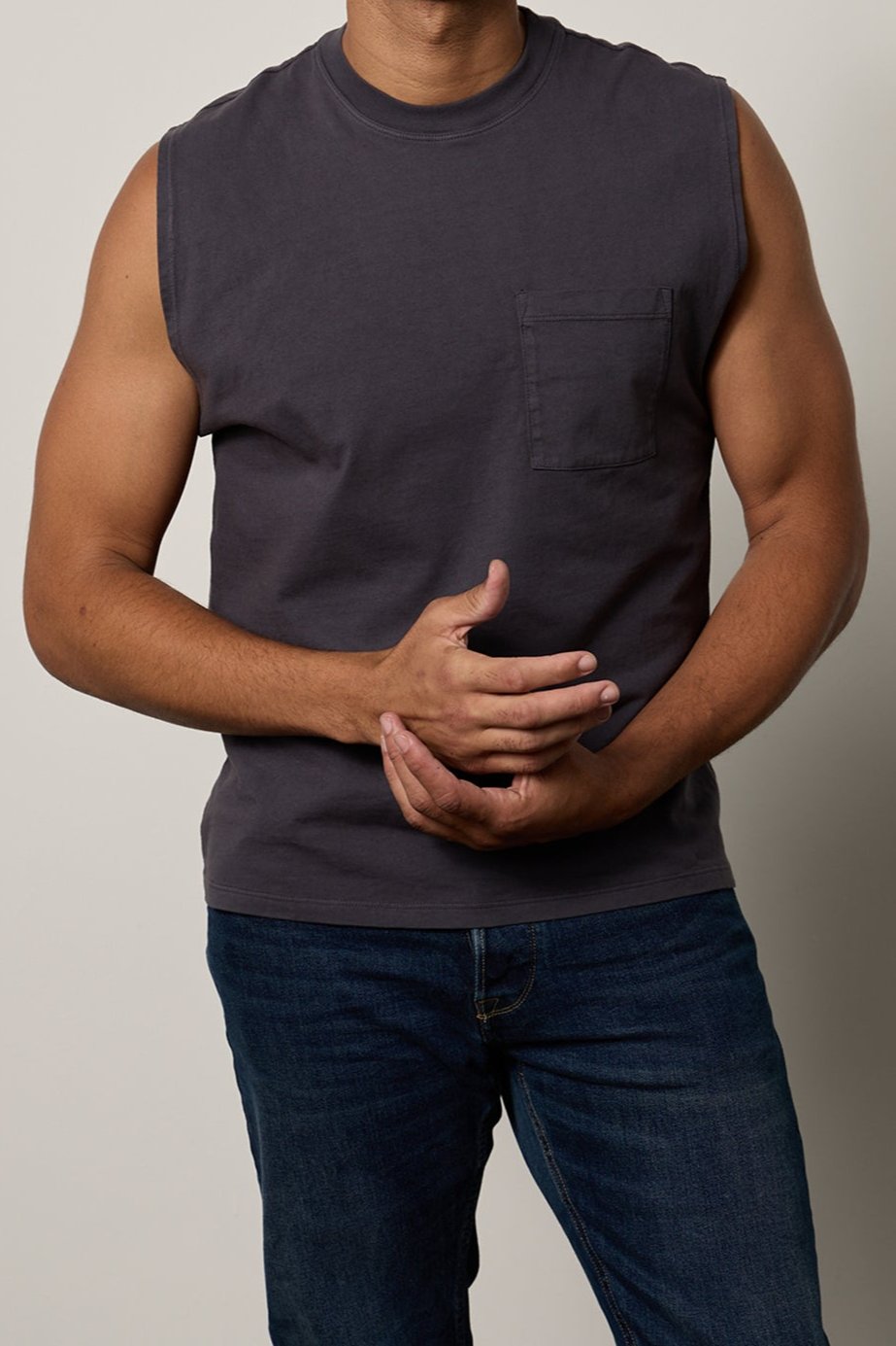 a man wearing a gray Velvet by Graham & Spencer Layne Crew Neck Muscle Tee.-26266401996993
