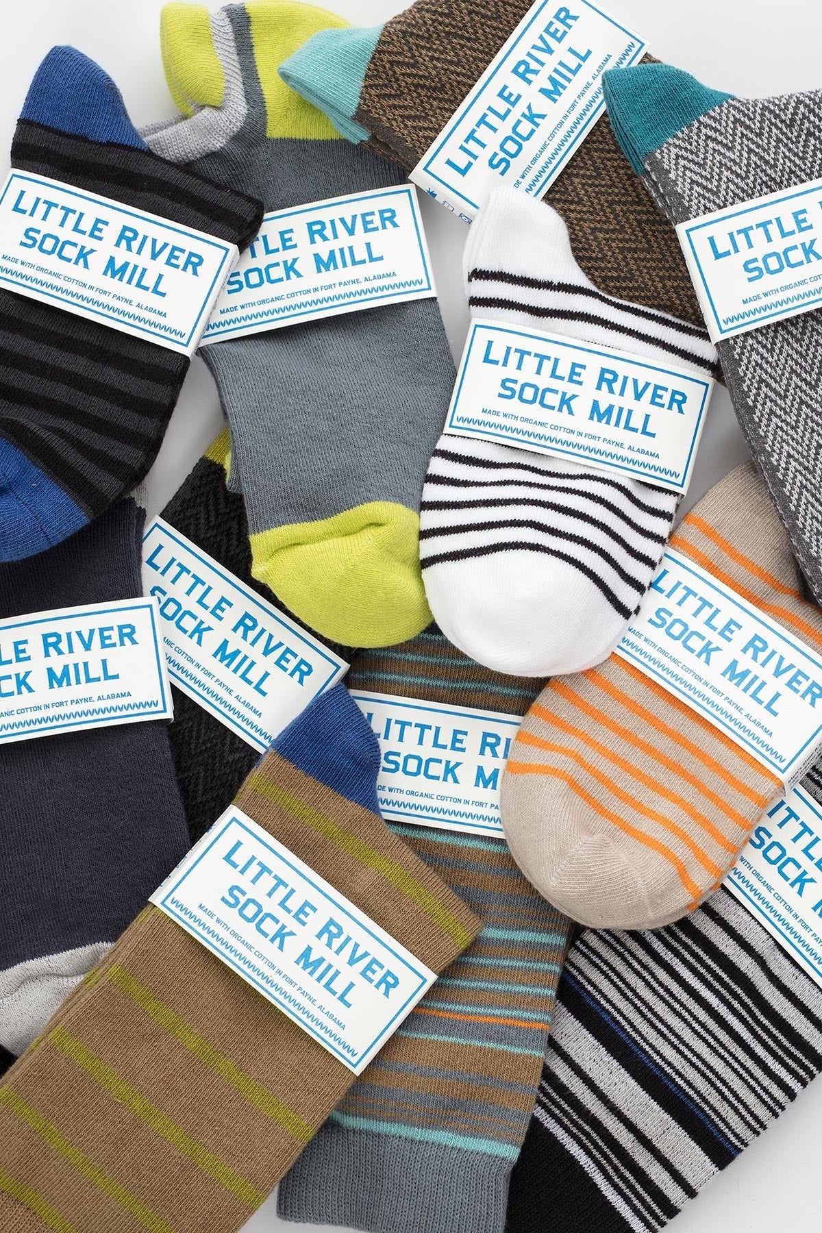 The Cushioned No Show Sock by Little River features colorful patterns, an attached Little River label, and is crafted from organic cotton using sustainable practices for classic, comfortable wear.-660027015249