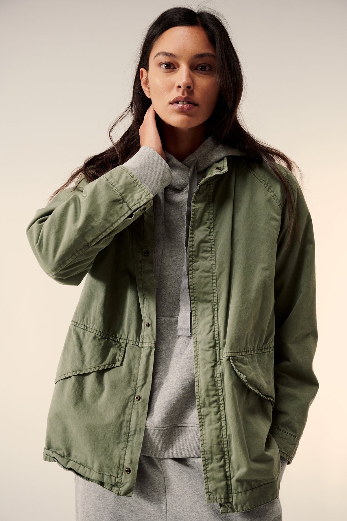 a woman wearing a Velvet by Jenny Graham MELROSE JACKET and a hoodie.