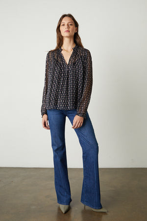 Carla Printed Lurex Stripe top in Starlit pattern with blue denim and heels full length front