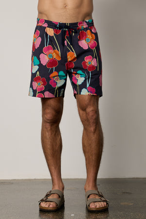 Colt Short front in bahama print with bold, multi colored floral pattern with dark background