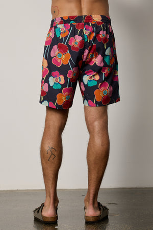 Colt Short back in bahama print with bold, multi colored floral pattern with dark background