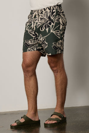 Colt Short front & side in catalina print with bold, black and cream pattern on dark green background