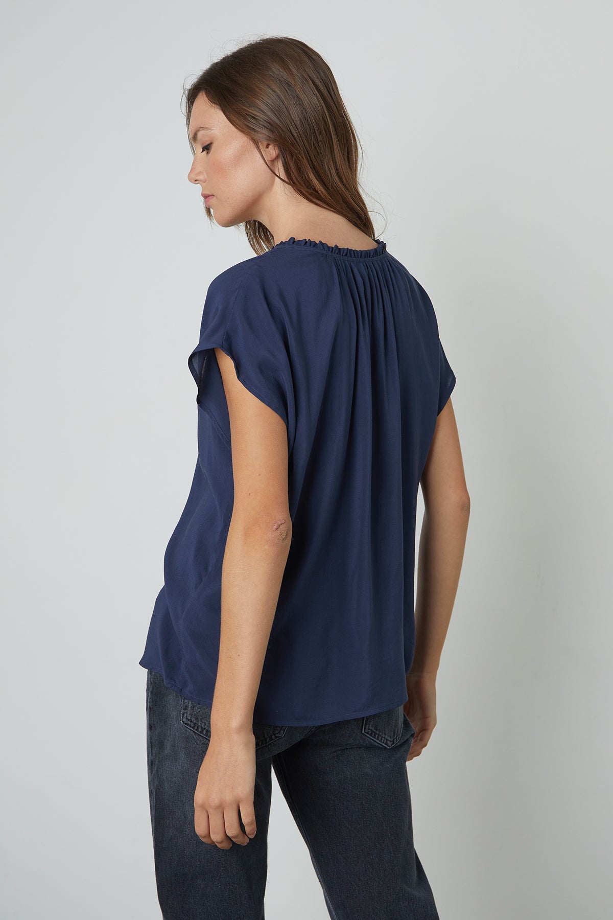 Sarena Cap Sleeve Blouse in postman back view-24994292498625