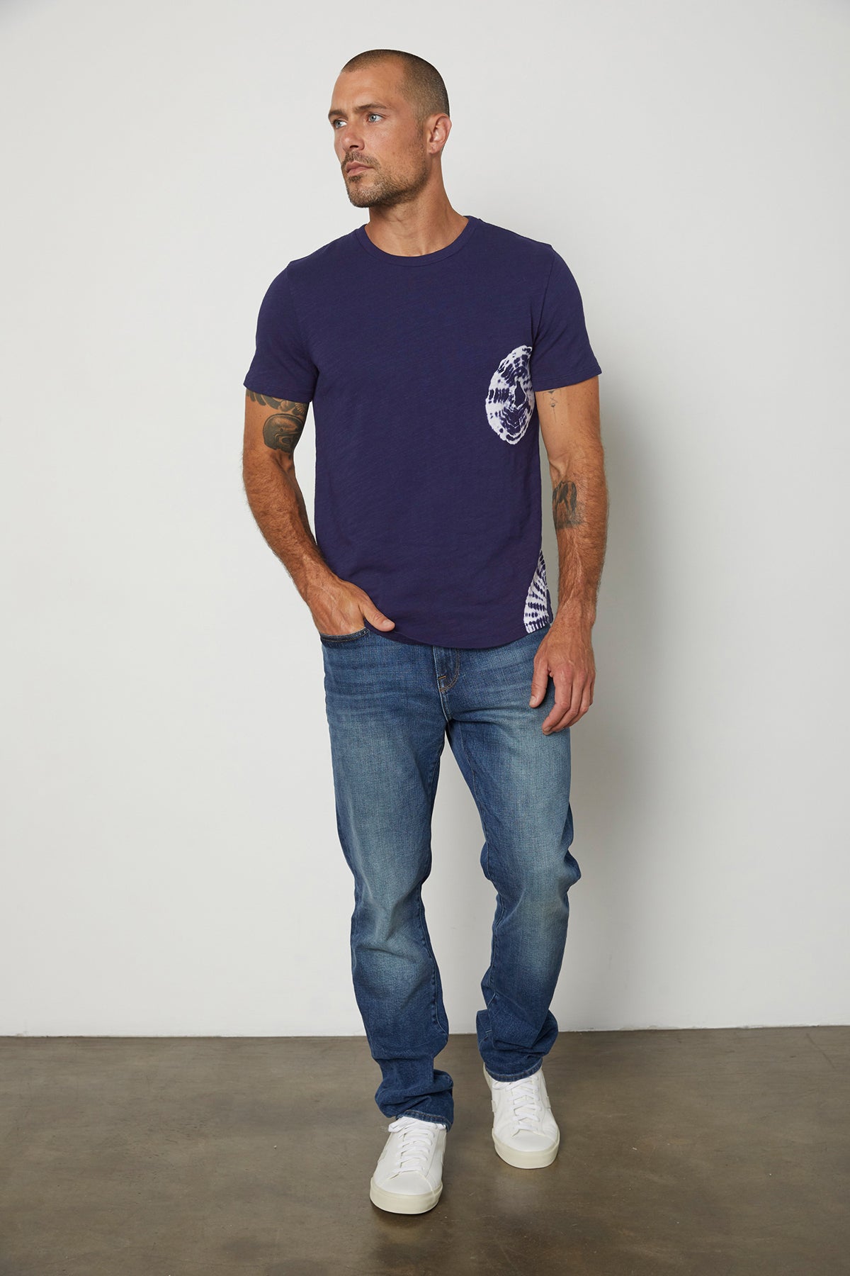 Asher in navy front tee