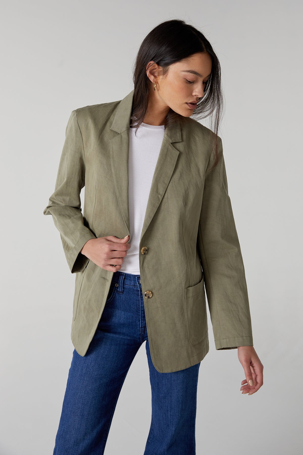 The model is wearing a Velvet by Jenny Graham ECHO BLAZER and jeans.-25316107387073
