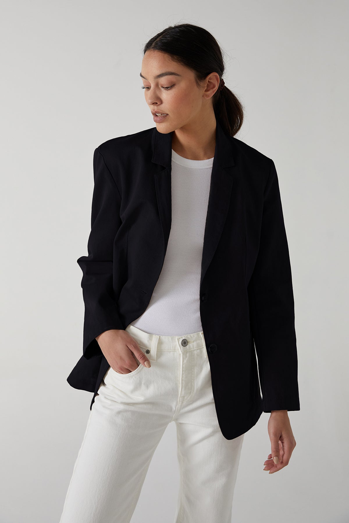 Velvet by Jenny Graham Oversized Echo Blazer in Vintage Black over Cruz Tank Top in White Tucked into White Denim Front-25154551087297
