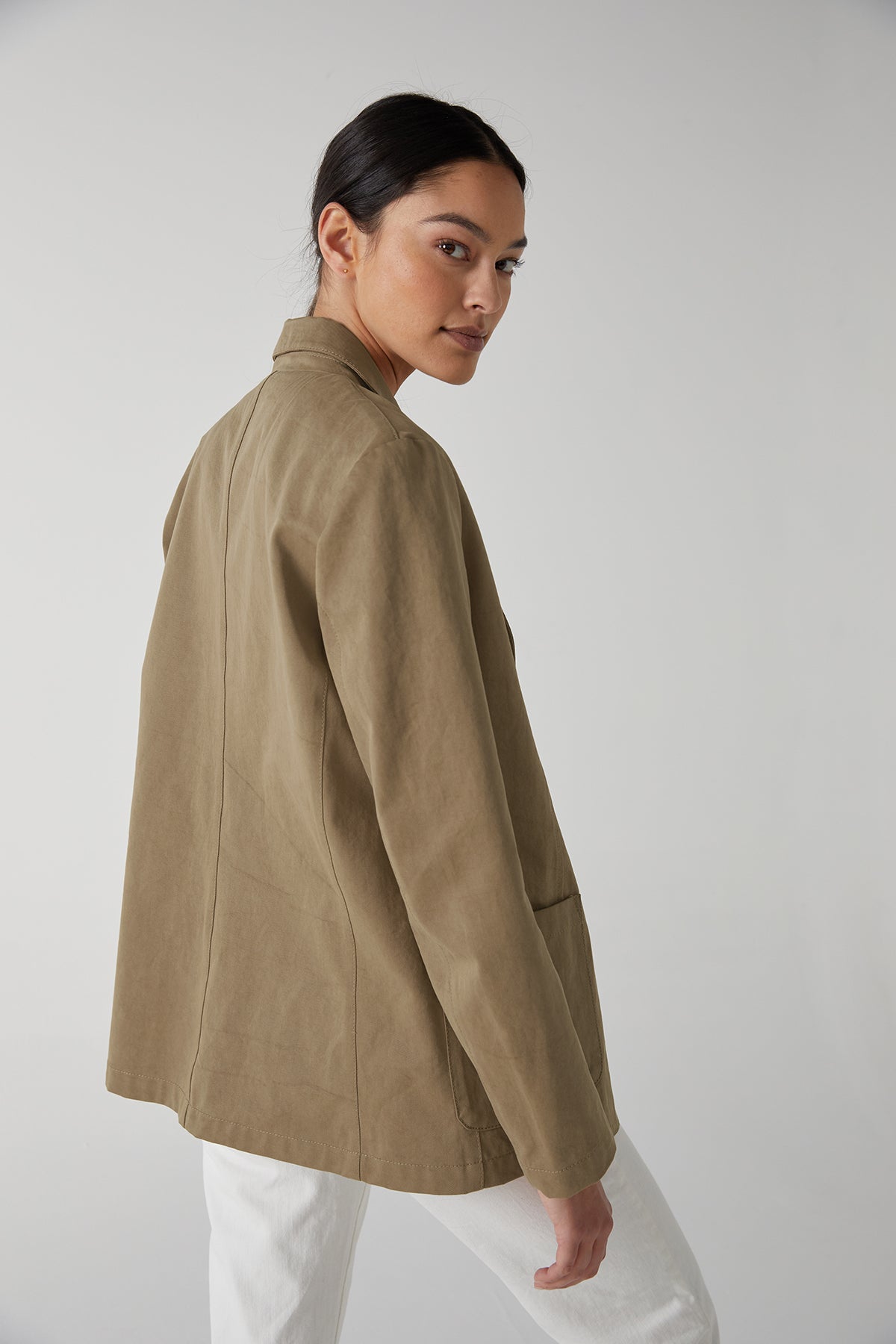 the back view of a woman wearing a Velvet by Jenny Graham ECHO BLAZER jacket.-25316123934913