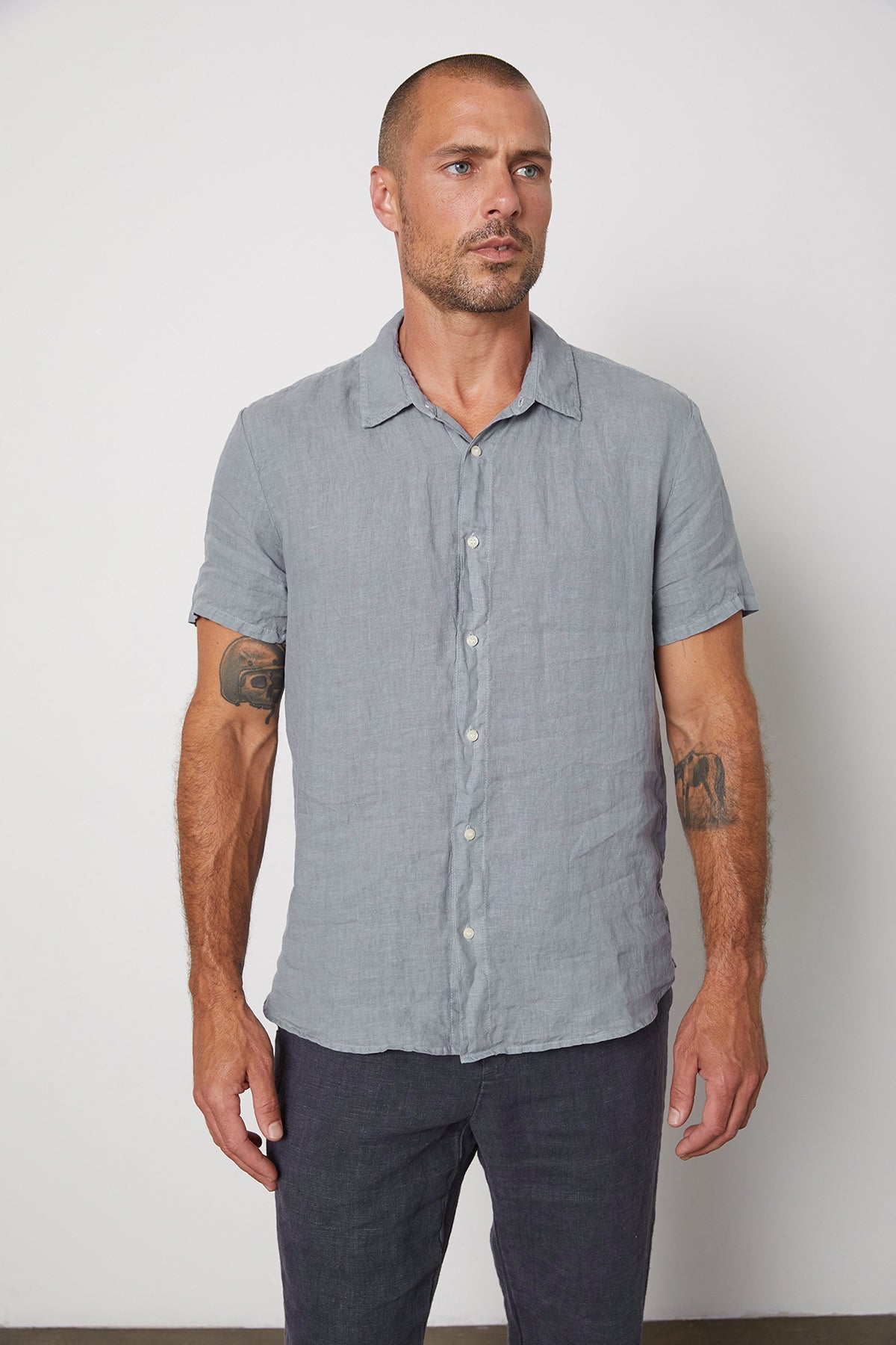 The MACKIE LINEN BUTTON-UP SHIRT in grey is a must-have addition to your summer wardrobe.-25578273374401