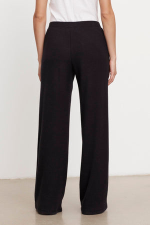 The back view of a person wearing Velvet by Graham & Spencer's KACIE BRUSHED RIB PANT.
