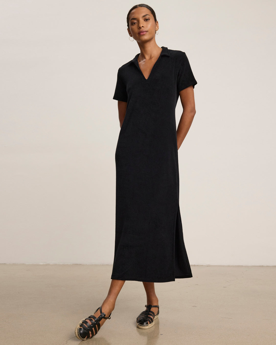 A woman wearing the Lianne Dress by Velvet by Graham & Spencer.