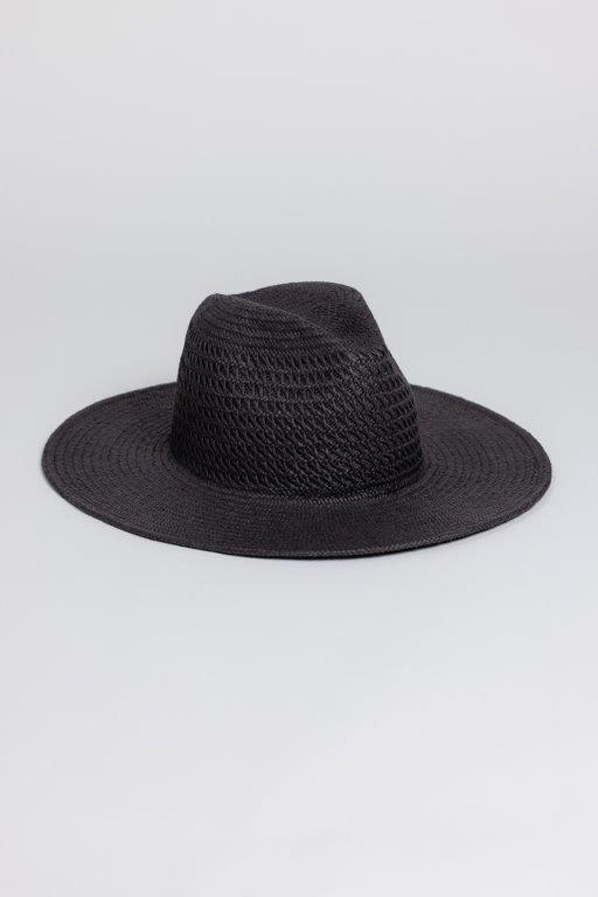 The LUXE VENTED PACKABLE HAT by Velvet by Graham & Spencer, a black natural paper straw wide-brim Panama, is displayed on a plain light gray background.