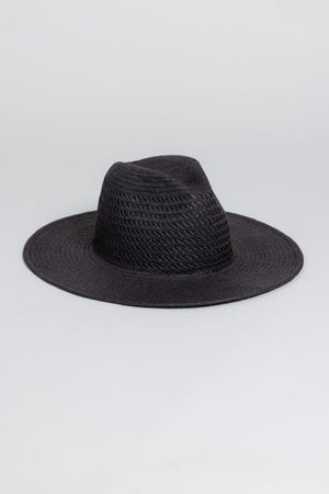 The LUXE VENTED PACKABLE HAT by Velvet by Graham & Spencer, a black natural paper straw wide-brim Panama, is displayed on a plain light gray background.