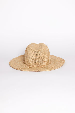 The AMELIA FEDORA by Velvet by Graham & Spencer, a wide-brimmed natural straw hat, is displayed against a plain white background.
