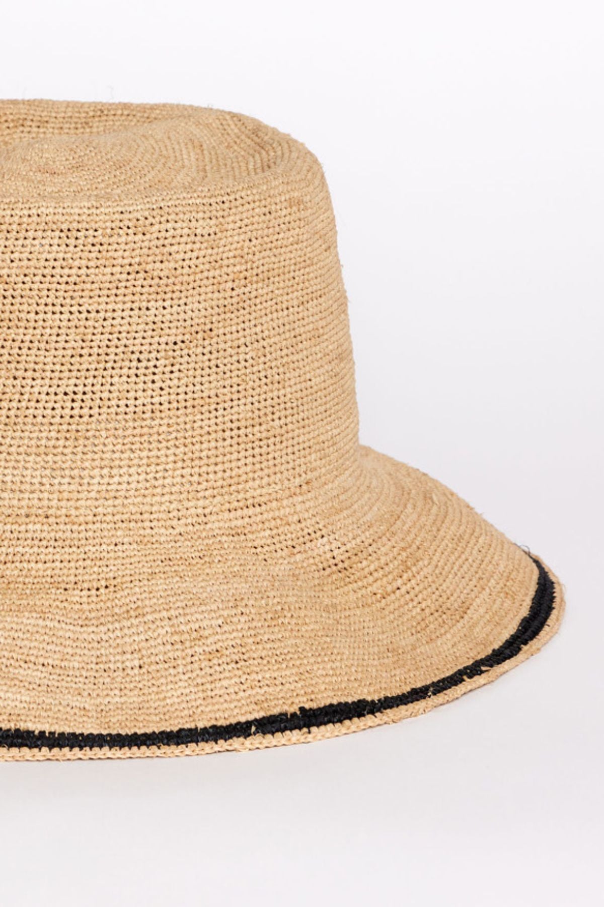 The STRIPE EDGE MODERN CROCHET BUCKET HAT by Velvet by Graham & Spencer features a wide brim and thin black edge, shown on a plain white background.-41323209588929