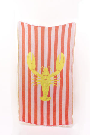 The NOVELTY TURKISH TOWEL by Velvet by Graham & Spencer has vertical red and white stripes with a large yellow lobster in the center, adding a vibrant touch to your beach days.