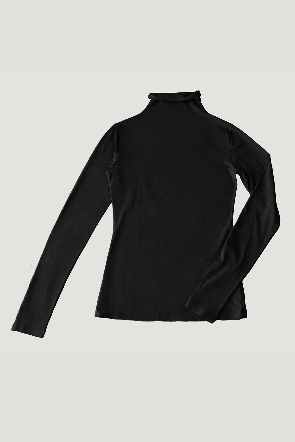   A versatile wardrobe essential, the TALISIA TEE by Velvet by Graham & Spencer is a long-sleeved black turtleneck shirt perfect for any fashion-forward individual, set against a plain light background. 