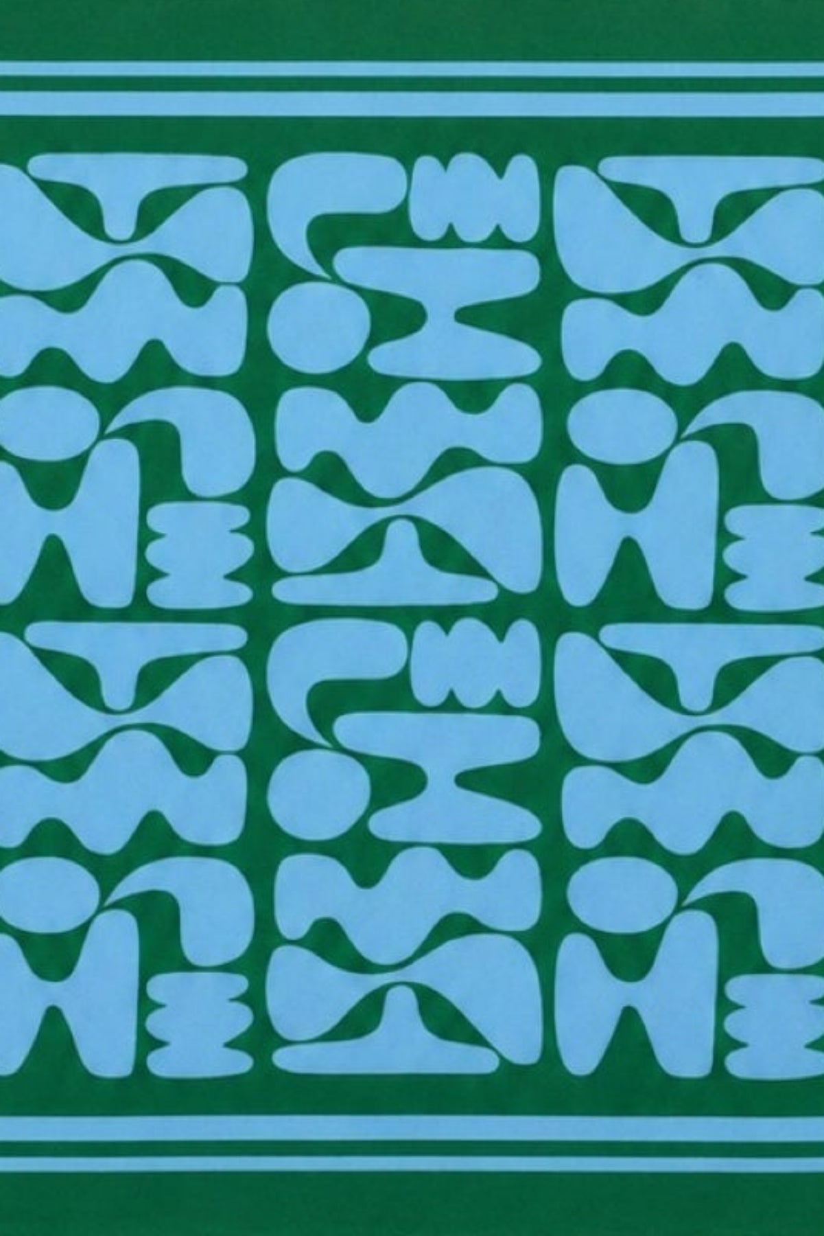 Blue geometric pattern with a green border scarf against a beige background-41645285769409