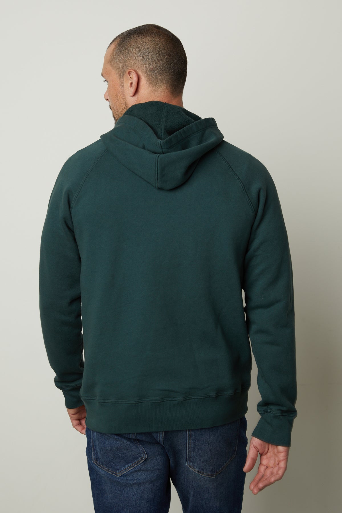 The back view of a man experiencing superior comfort in a Velvet by Graham & Spencer HOPKIN PULLOVER HOODIE.-35782823313601