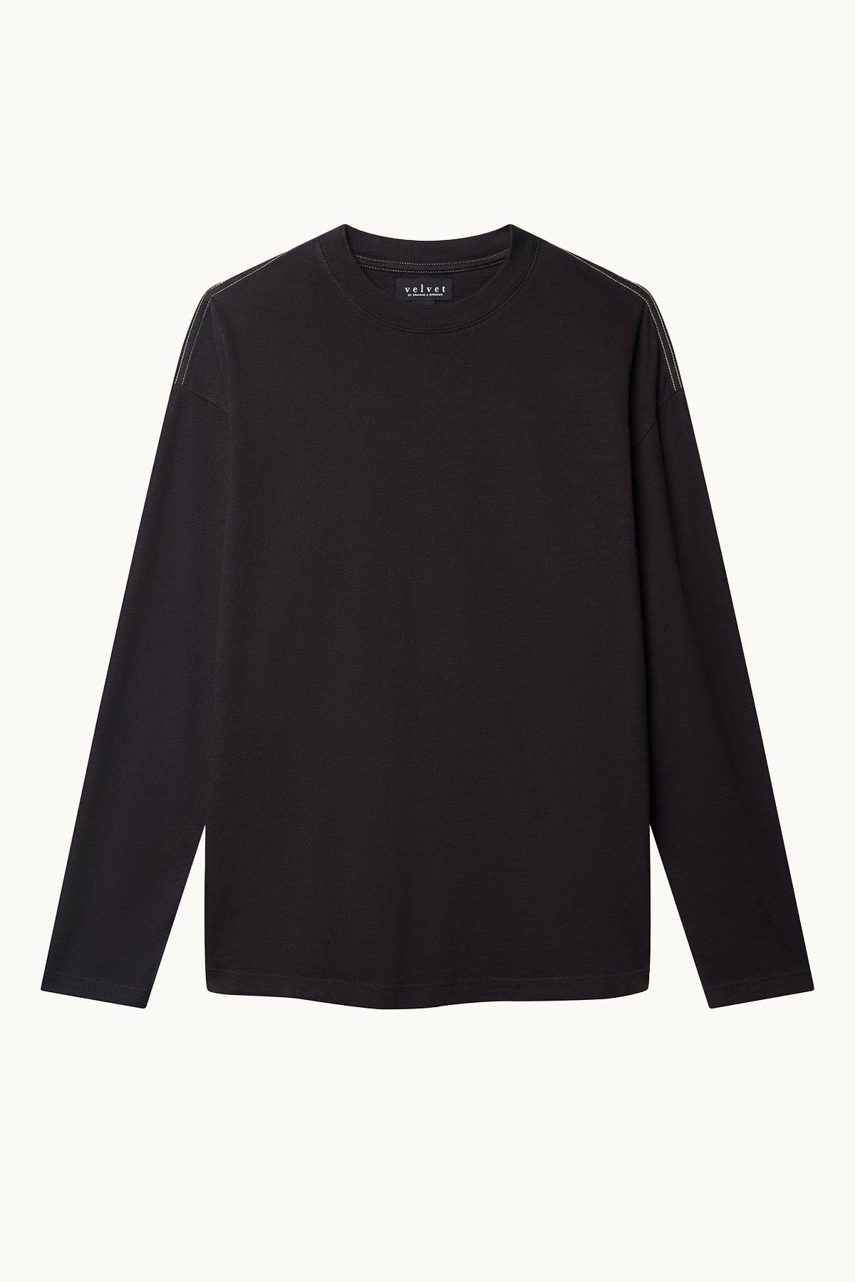 The SLATER TEE by Velvet by Graham & Spencer is a black long-sleeve shirt made from structured pima cotton jersey, featuring a round neckline on a plain white background. Its relaxed fit ensures comfort, making it a versatile wardrobe essential.-38325889794241