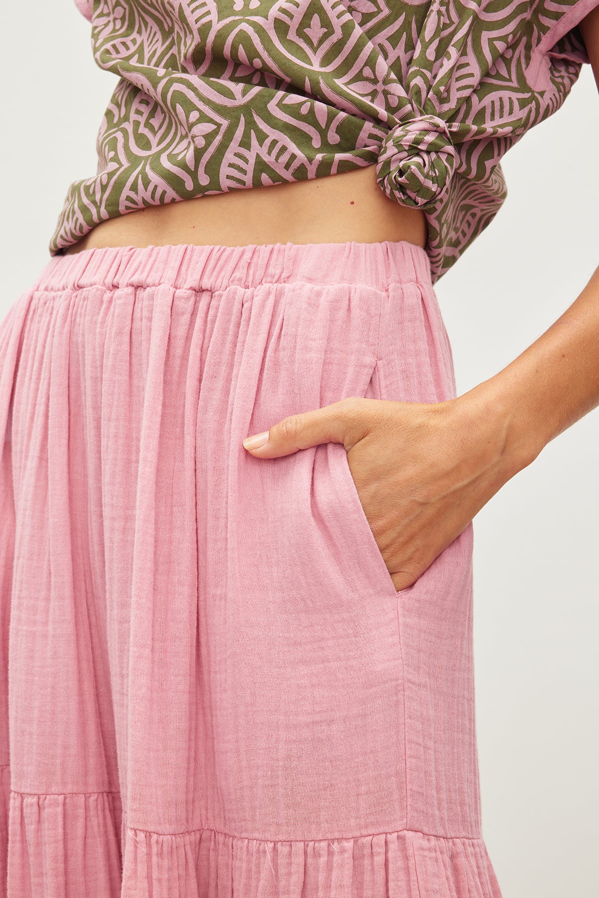 An essential Velvet by Graham & Spencer woman's pink Danielle Cotton Gauze Tiered Skirt, featuring an elastic waist and adorable ruffles.-35955694207169
