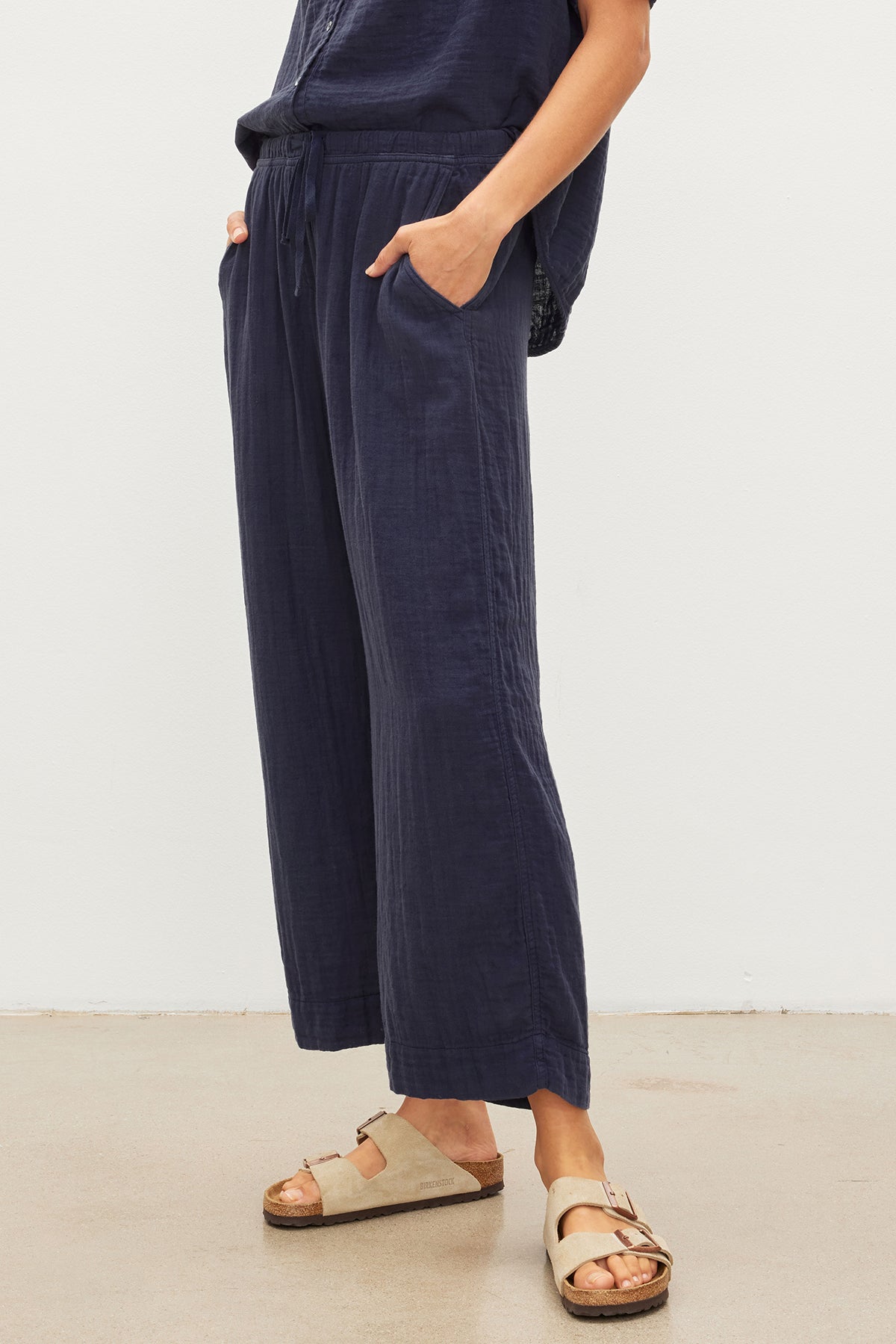 A woman wearing a FRANNY COTTON GAUZE PANT jumpsuit from her closet. (Brand Name: Velvet by Graham & Spencer)-35955718062273