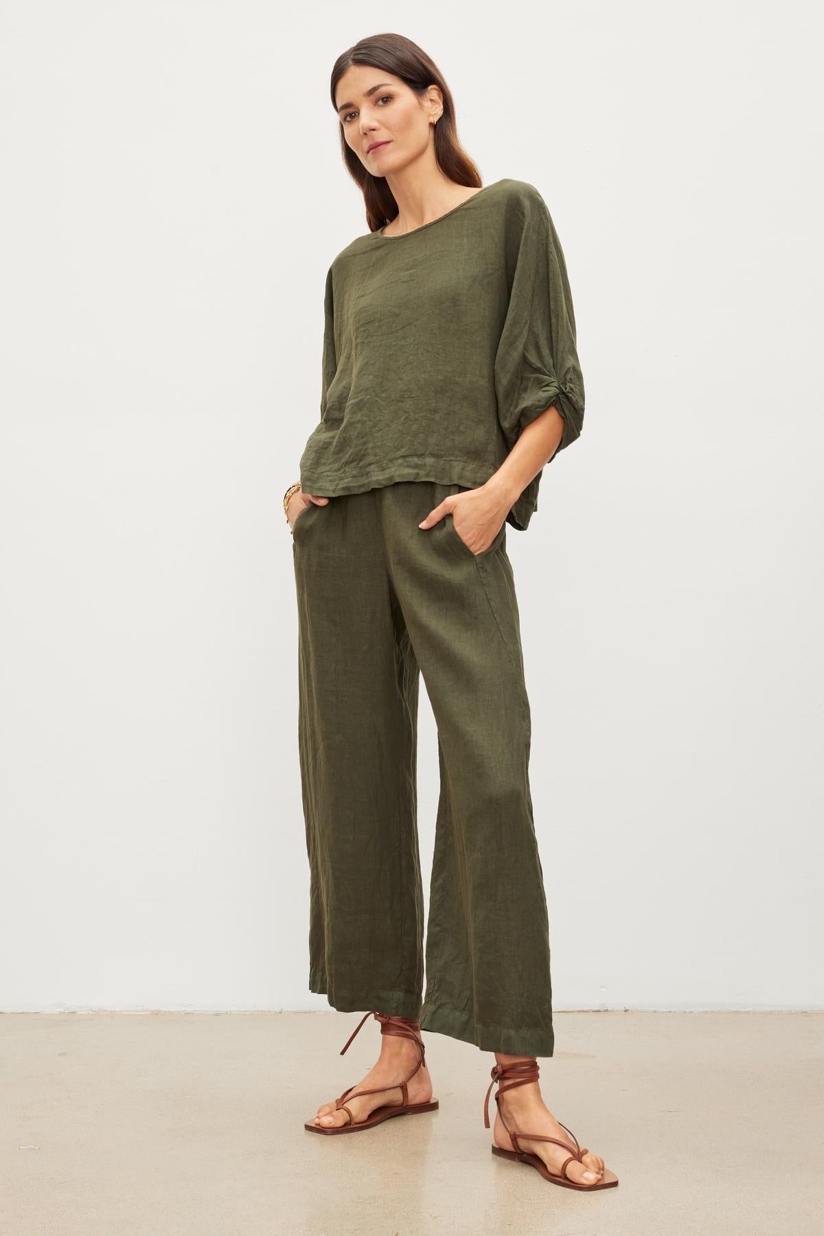 The perfect LOLA LINEN PANT by Velvet by Graham & Spencer in lightweight olive green, featuring an elastic waist.-36002694299841