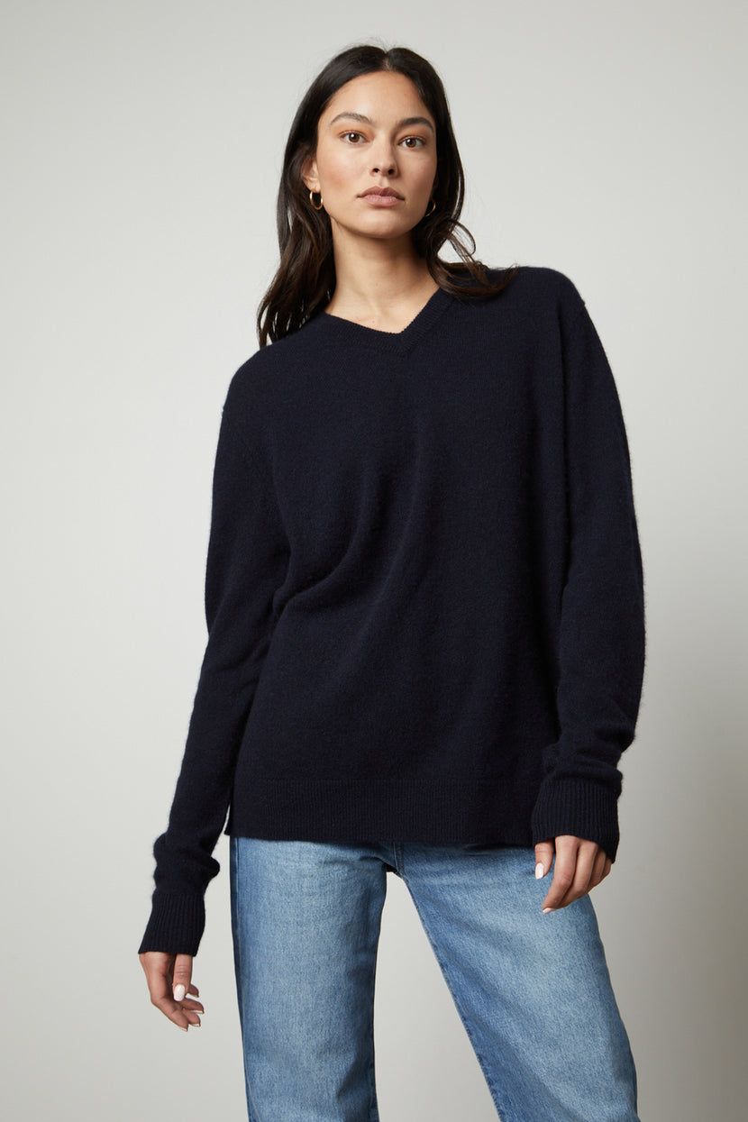 The Velvet by Graham & Spencer Harmony Cashmere V-Neck Sweater in navy.