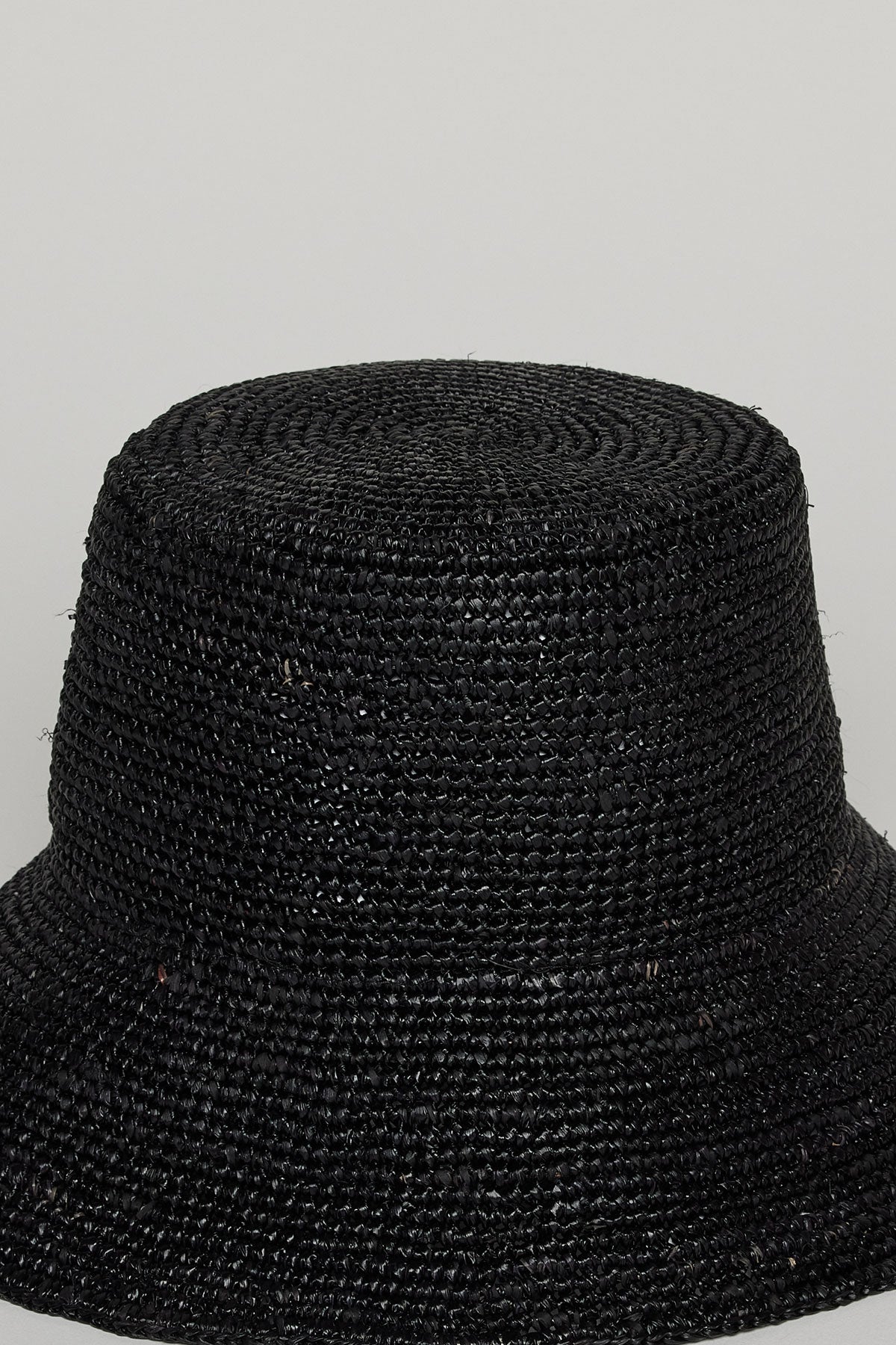 a CHIC CROCHET BUCKET HAT by Velvet by Graham & Spencer on a white background.-26537723068609