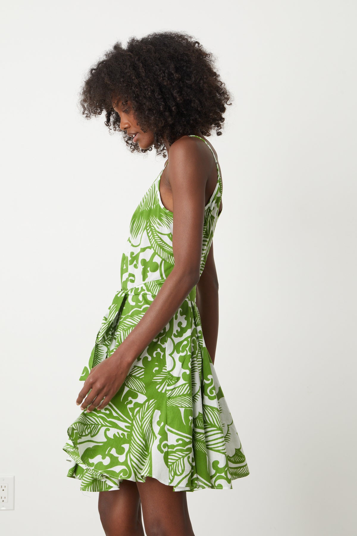 A woman wearing a Velvet by Graham & Spencer VIVIAN PRINTED DRESS.-26774913482945
