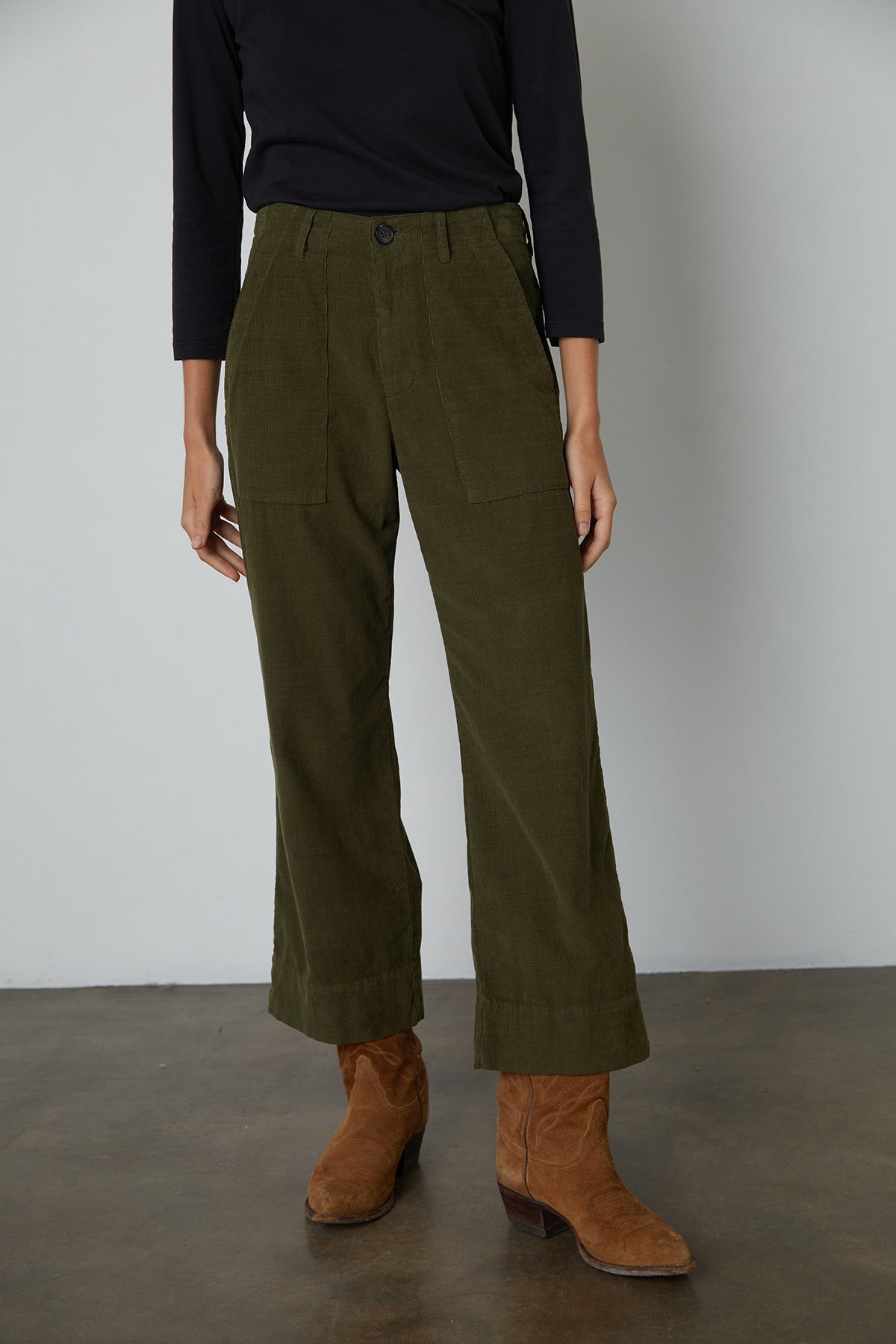   Vera Corduroy Wide Leg Pant in Aloe front standing with boots 