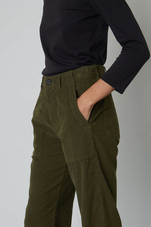 Vera Corduroy Wide Leg Pant in dark green dillweed pocket detail