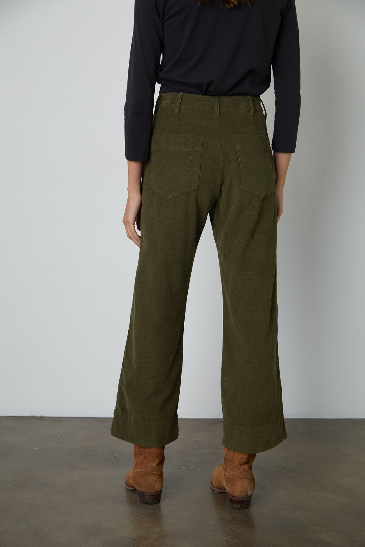 Vera Corduroy Wide Leg Pant in Aloe back standing with boots-26654355194049