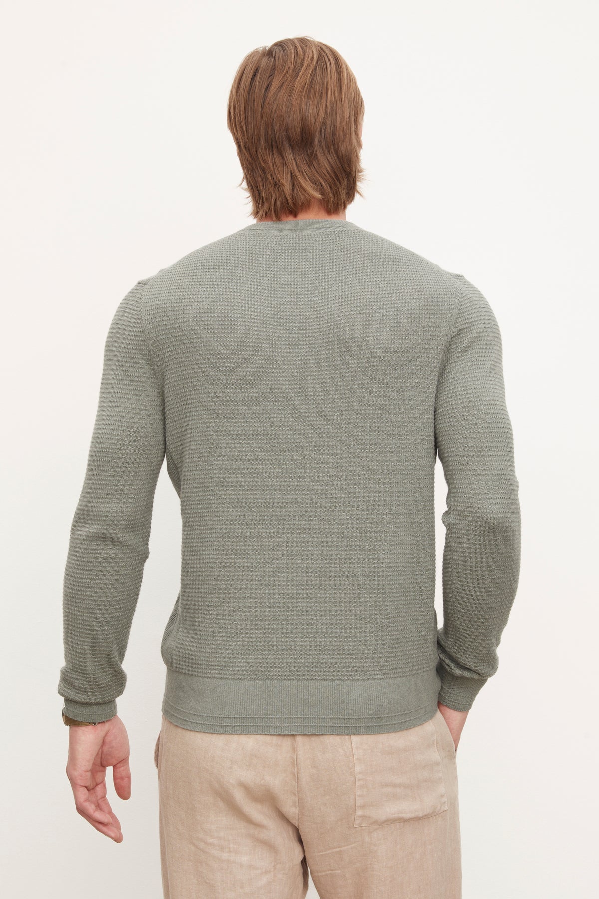 The back view of a man wearing a long-sleeve grey Velvet by Graham & Spencer ACE THERMAL CREW made of cotton with cashmere.-36008998764737