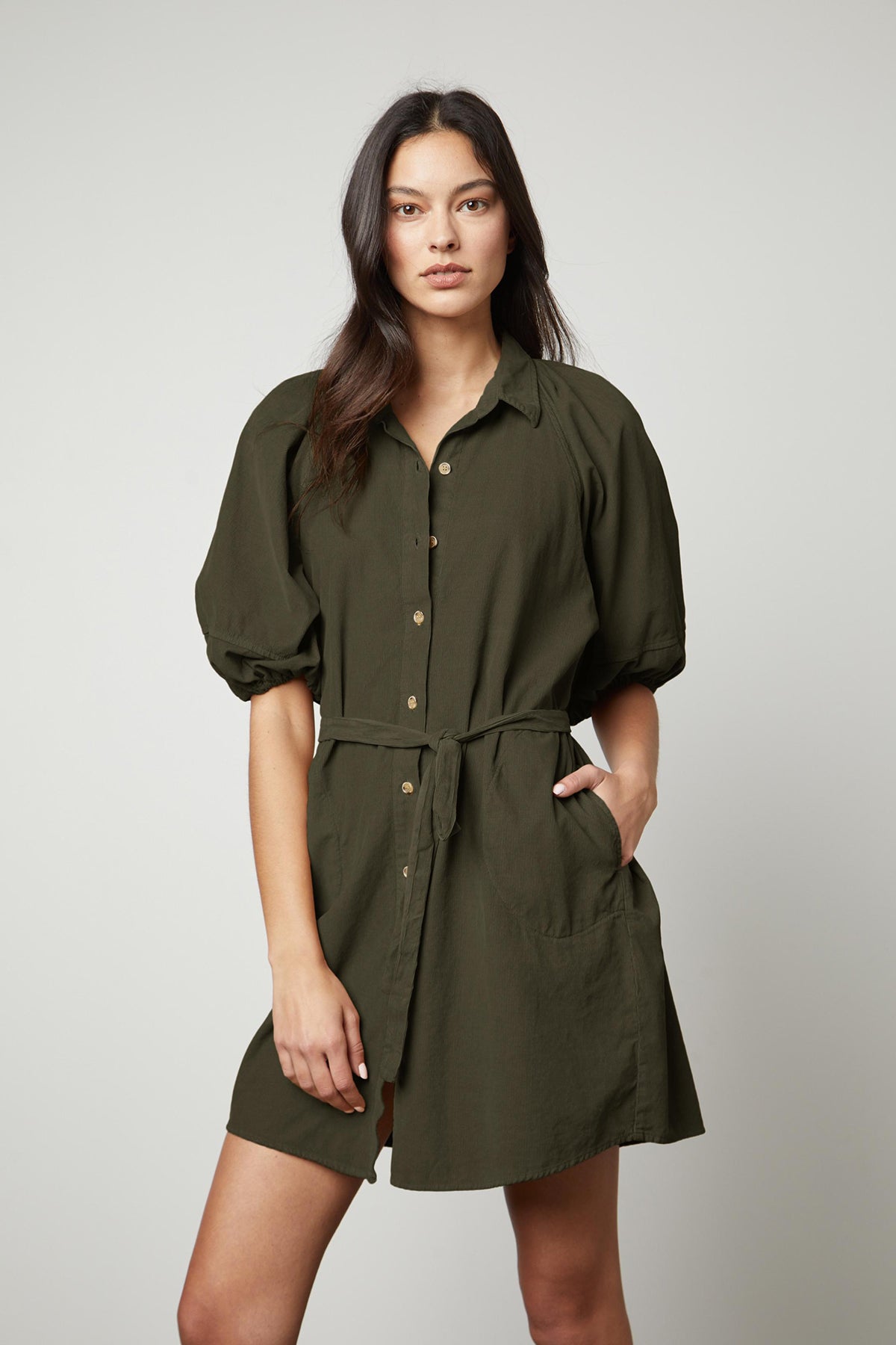 The KADY CORDUROY BUTTON-UP DRESS in olive green is a versatile everyday wear dress made of cotton corduroy by Velvet by Graham & Spencer.-26921328640193