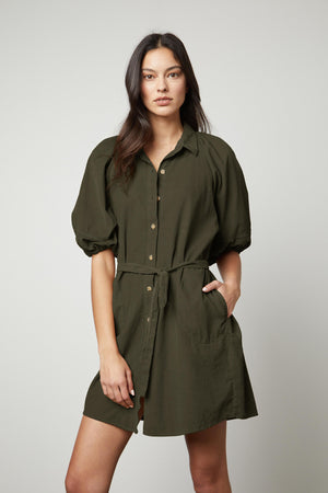 The KADY CORDUROY BUTTON-UP DRESS in olive green is a versatile everyday wear dress made of cotton corduroy by Velvet by Graham & Spencer.
