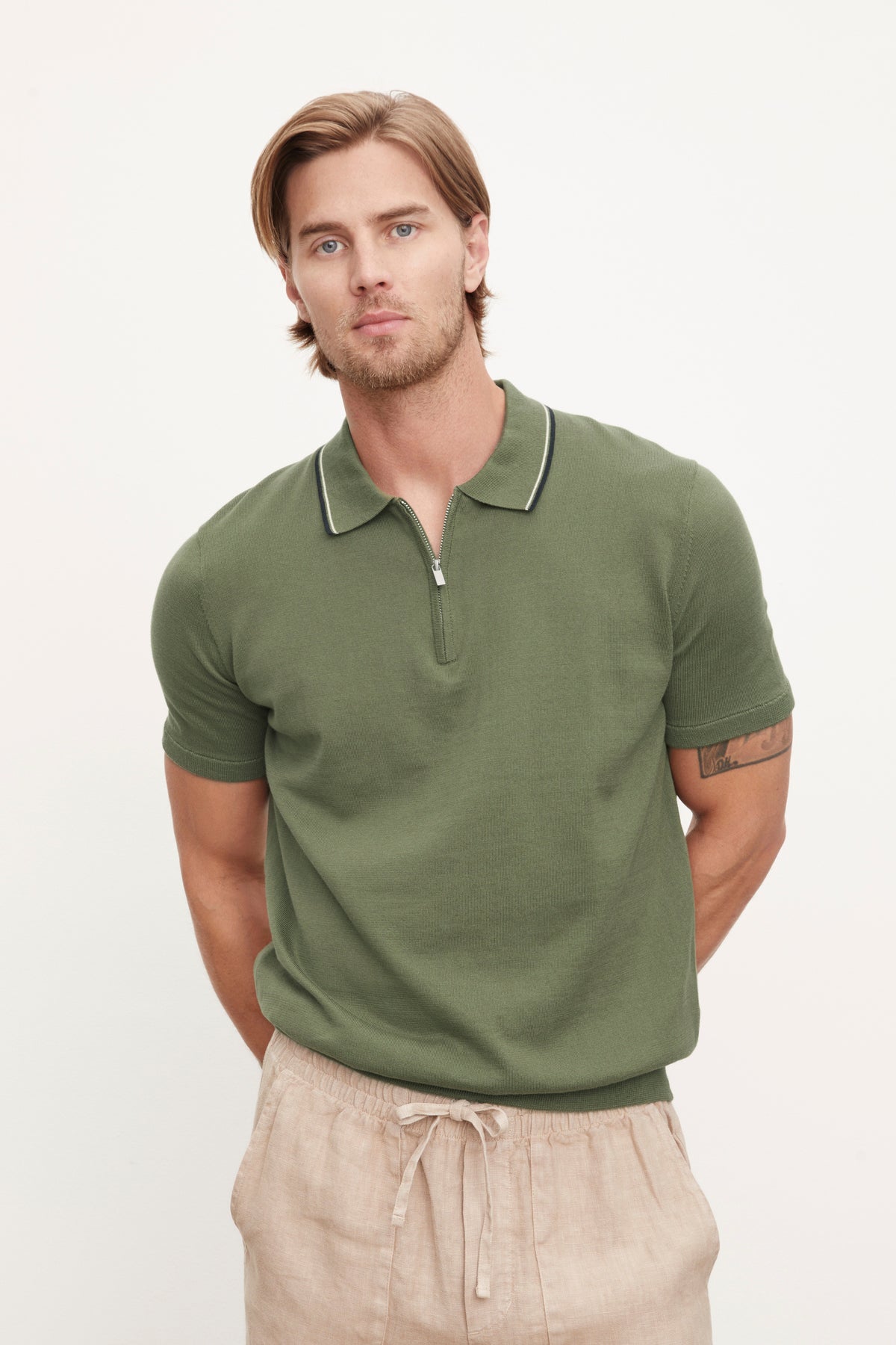 A man in an OTTO ZIP POLO by Velvet by Graham & Spencer.-36009964011713
