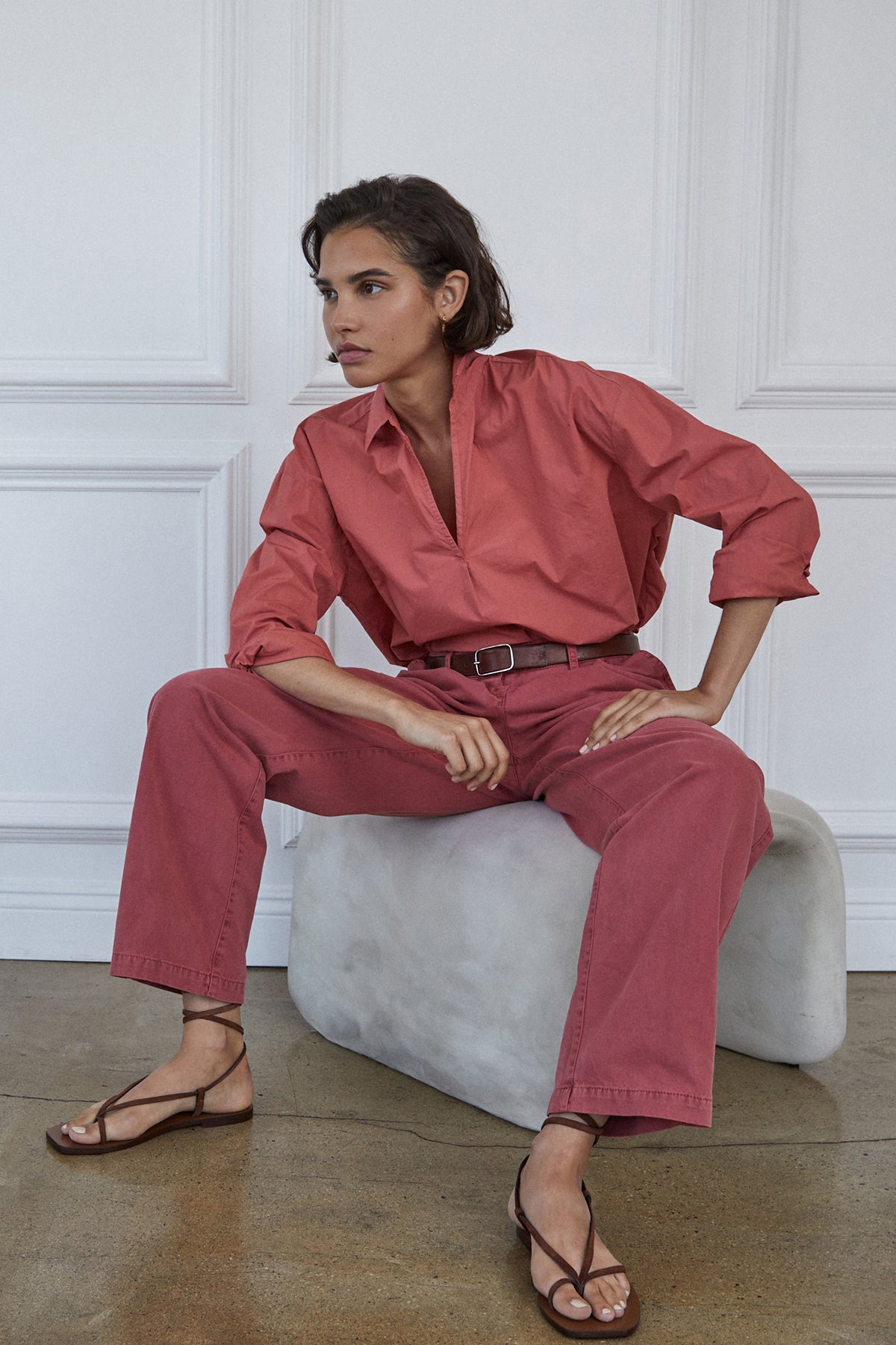 Model sitting on stool wearing Velvet by Jenny Graham Brea Shirt in cedar with Temescal pant in femme belted-26677421506753