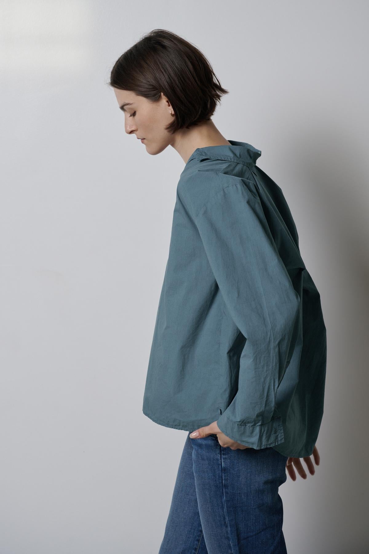   A woman wearing jeans and a Velvet by Jenny Graham BREA SHIRT view from side 
