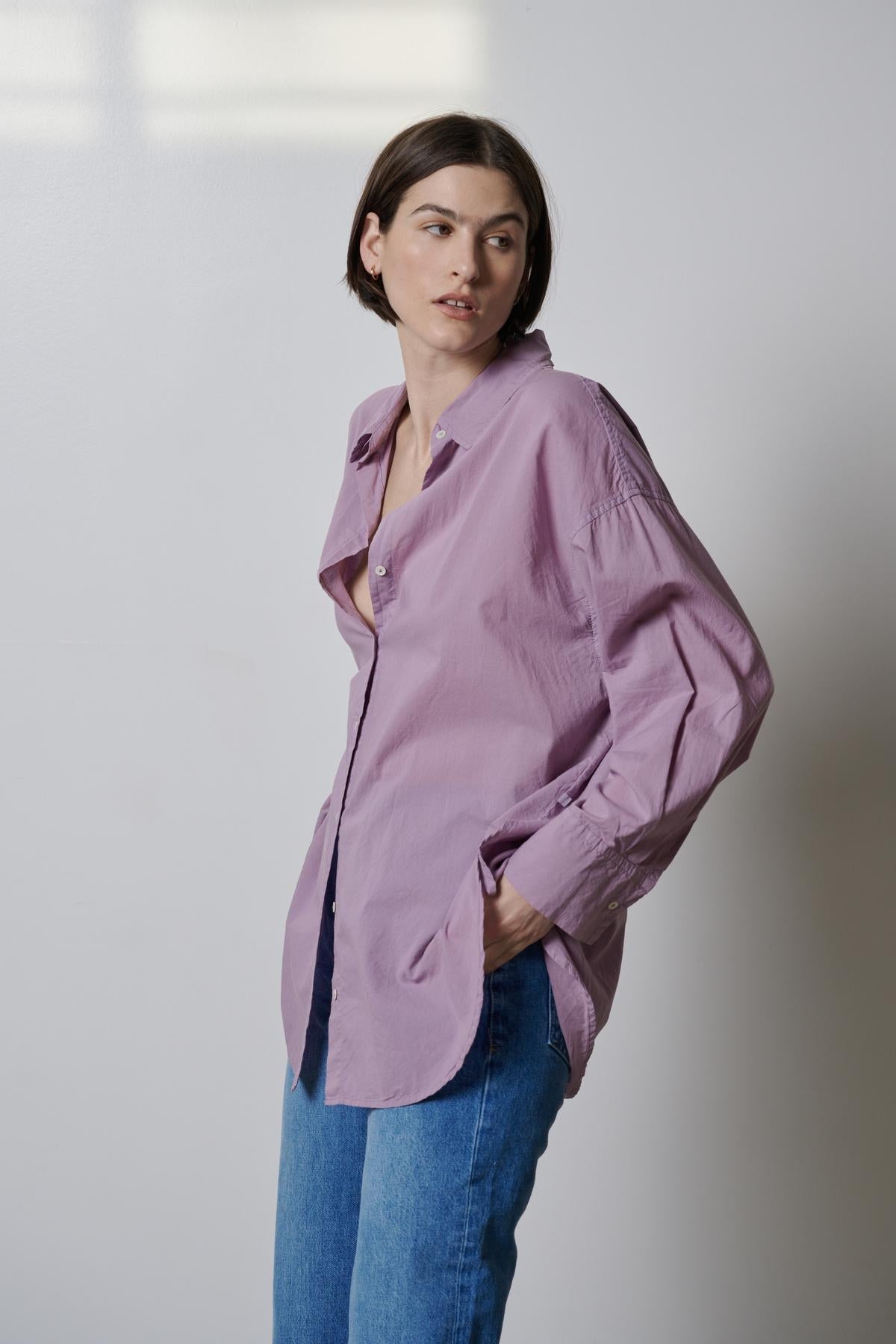   The model is wearing a Velvet by Jenny Graham REDONDO BUTTON-UP SHIRT and jeans. 
