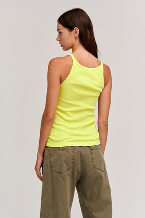 The back view of a woman wearing a Velvet by Graham & Spencer ALIZA RIBBED COTTON LAYERING TANK.