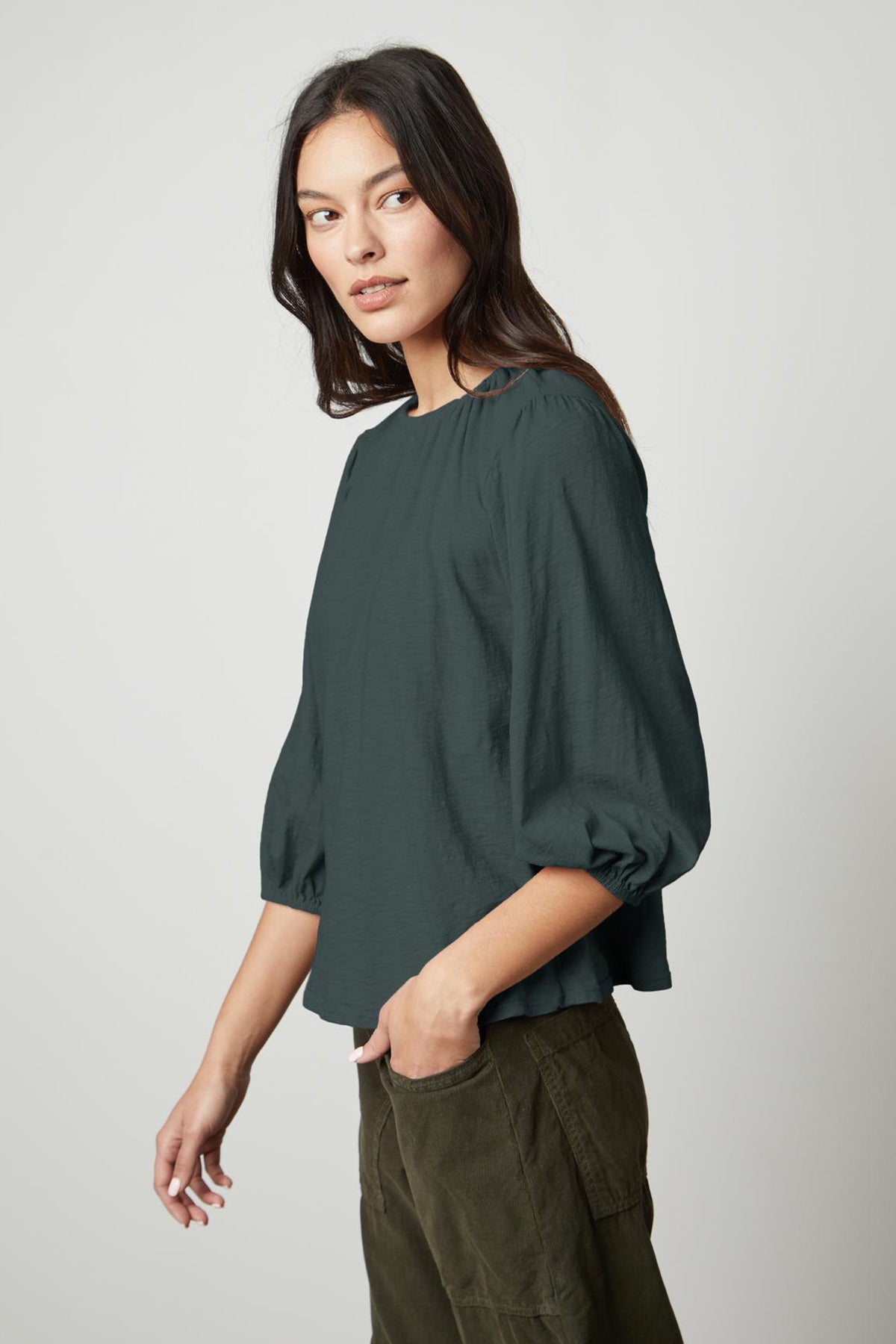   The JULIE 3/4 SLEEVE TEE by Velvet by Graham & Spencer in dark green. 