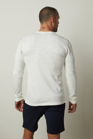 The back view of a man wearing a Velvet by Graham & Spencer GABE HENLEY.