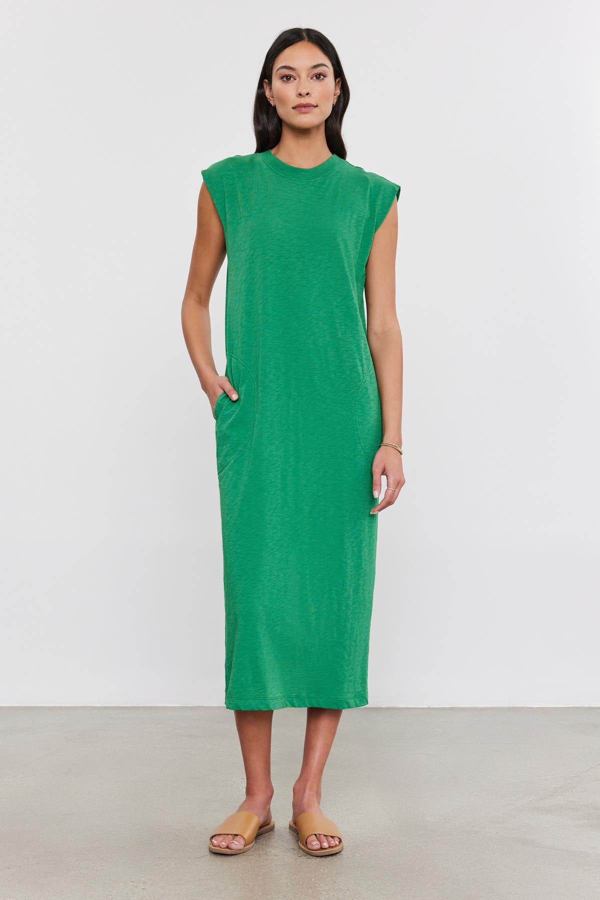   A woman in a LANE DRESS by Velvet by Graham & Spencer. 