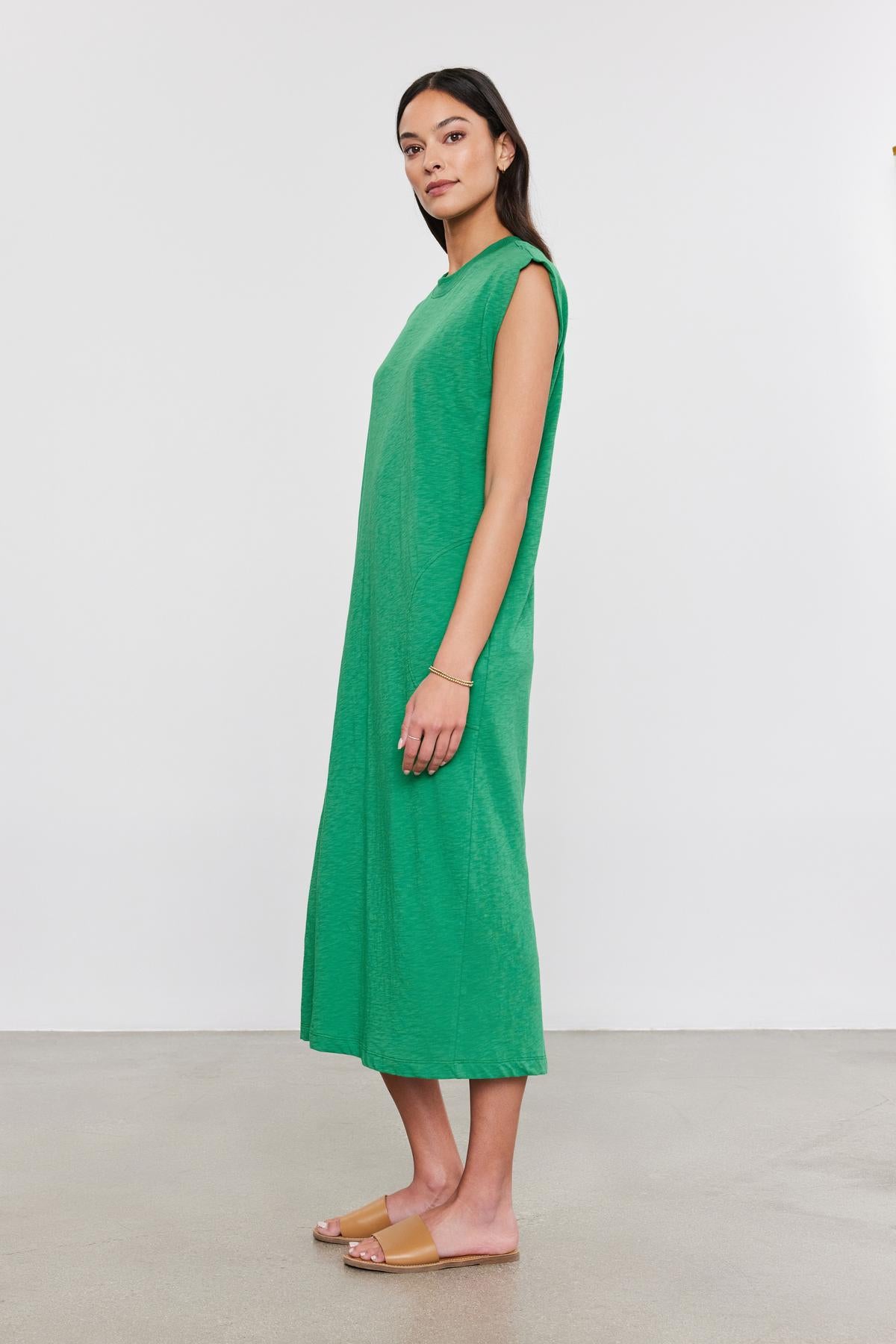   A woman in a LANE DRESS by Velvet by Graham & Spencer. 