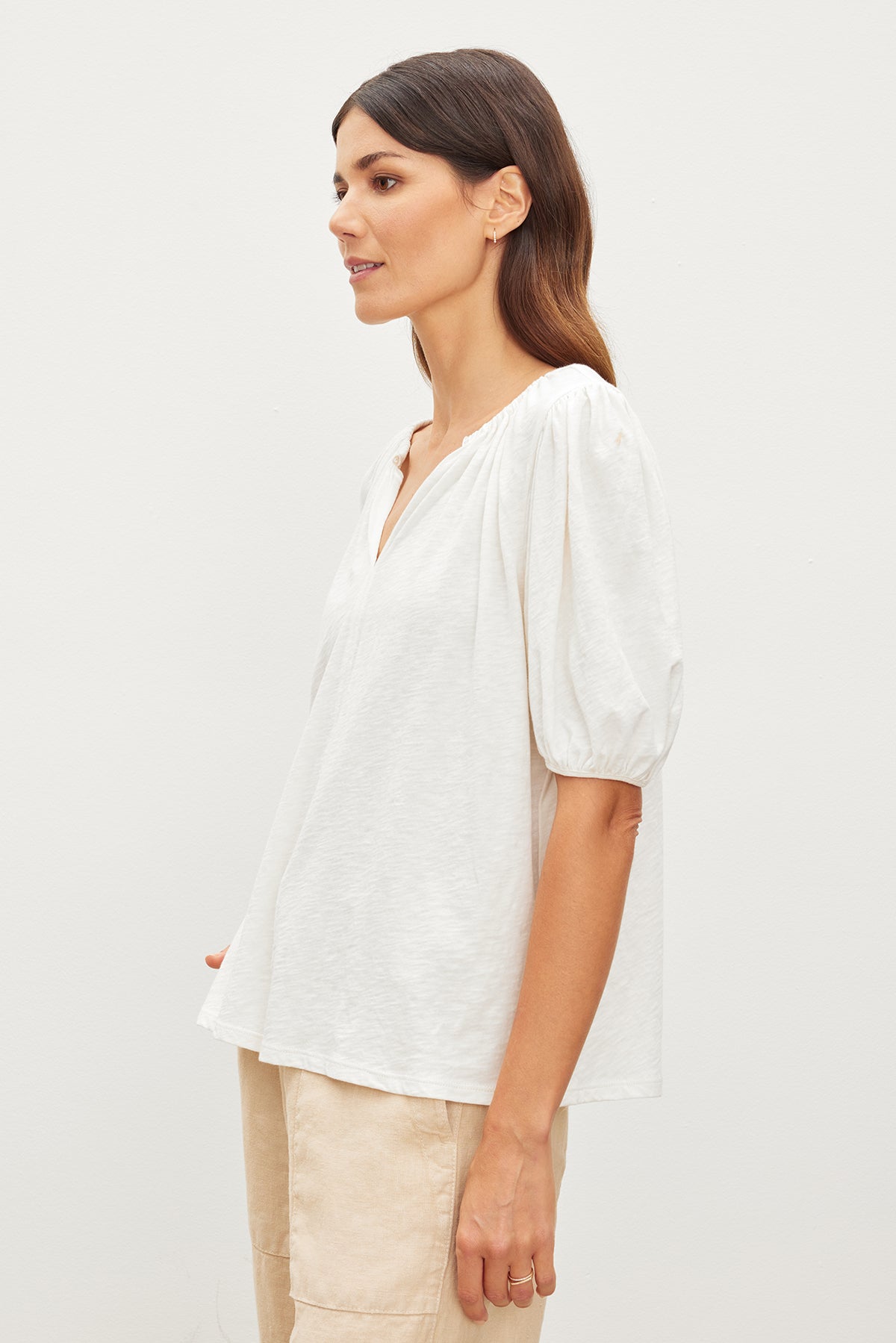  The LEE RELAXED TEE from Velvet by Graham & Spencer is paired with tan pants. 
