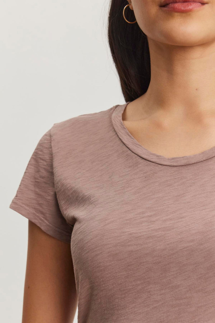 The ODELIA TEE by Velvet by Graham & Spencer features a classic crew neckline and short sleeves in light brown cotton slub, showcased on a plain white background—an essential piece for any wardrobe.